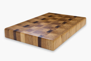 hand crafted large rectangular cutting board made of white oak and walnut end grains focus